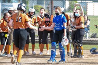 Rusty Rae/News-Register##
Amity catcher Megan Scharf displays excellent sportsmanship, congratulating Yamhill-Carlton’s Hailee Stephenson on her two-run home run during Tuesday’s PacWest Conference clash. Rusty Rae/News-Register##
Amity catcher Megan Scharf displays excellent sportsmanship, congratulating Yamhill-Carlton’s Hailee Stephenson on her two-run home run during Tuesday’s PacWest Conference clash.
