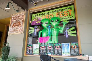 Rockne Roll/News-Register##McMenamin’s Hotel Oregon decorated its window
for the upcoming UFO Festival.