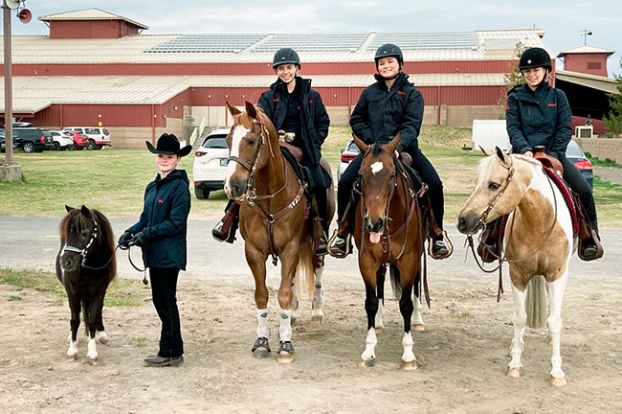 Photo courtesy Julie Jensen##
The McMinnville/Dayton Oregon High School Equestrian Team (OHSET), consisting of (l-r) Pia Robinson with Little Pepper, Molly Everingham with Diego, Sophia Maki with Levi and Anna Baumholtz with Pistol, captured fourth place in Versatility during last weekend’s state championship meet in Redmond.