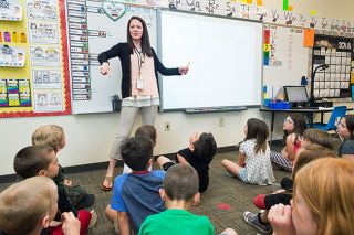 Marcus Larson/News-Register##Ashley Allen leads her Memorial Elementary School class in a math exercise. She and other McMinnville educators say developing relationships with students is the key to good teaching. Marcus Larson/News-Register##Ashley Allen leads her Memorial Elementary School class in a math exercise. She and other McMinnville educators say developing relationships with students is the key to good teaching.