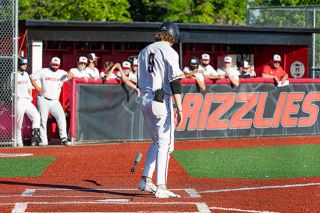 Marcus Larson/News-Register##
Senior shortstop Ky Hoskinson tosses his bat to the ground in disappointment following his game-ending strikeout against Sherwood during Friday’s regular season finale. McMinnville led 8-0 in the game, but eventually lost 11-8 to surrender a share of the league championship to the Bowmen. Marcus Larson/News-Register##
Senior shortstop Ky Hoskinson tosses his bat to the ground in disappointment following his game-ending strikeout against Sherwood during Friday’s regular season finale. McMinnville led 8-0 in the game, but eventually lost 11-8 to surrender a share of the league championship to the Bowmen.