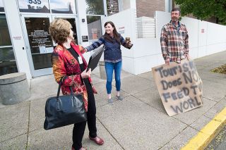 Marcus Larson/News-Register##Current Yamhill County Commissioner Mary Starrett greets future commissioner Lindsay Berschauer, while maintaining social distancing policy, during the Yamhelas Westsider Trail protest outside the Yamhill County Courthouse.