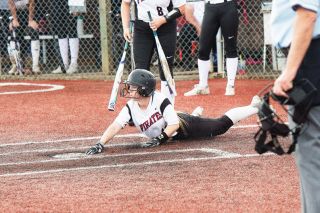 Rusty Rae/News-Register##
Dayton senior Emily Elliott is easily safe on a slide home against Creswell in the first round of the 3A state softball tournament. After tough early innings, the Pirates went small ball and took the win, 12-2. Rusty Rae/News-Register##
Dayton senior Emily Elliott is easily safe on a slide home against Creswell in the first round of the 3A state softball tournament. After tough early innings, the Pirates went small ball and took the win, 12-2.