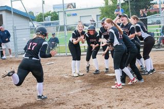Rusty Rae/News-Register##
Payton Hudson (17) is welcomed home by joyous teammates after her walk-off, game-winning homer in the bottom of the ninth inning against Lake Oswego. Rusty Rae/News-Register##
Payton Hudson (17) is welcomed home by joyous teammates after her walk-off, game-winning homer in the bottom of the ninth inning against Lake Oswego.