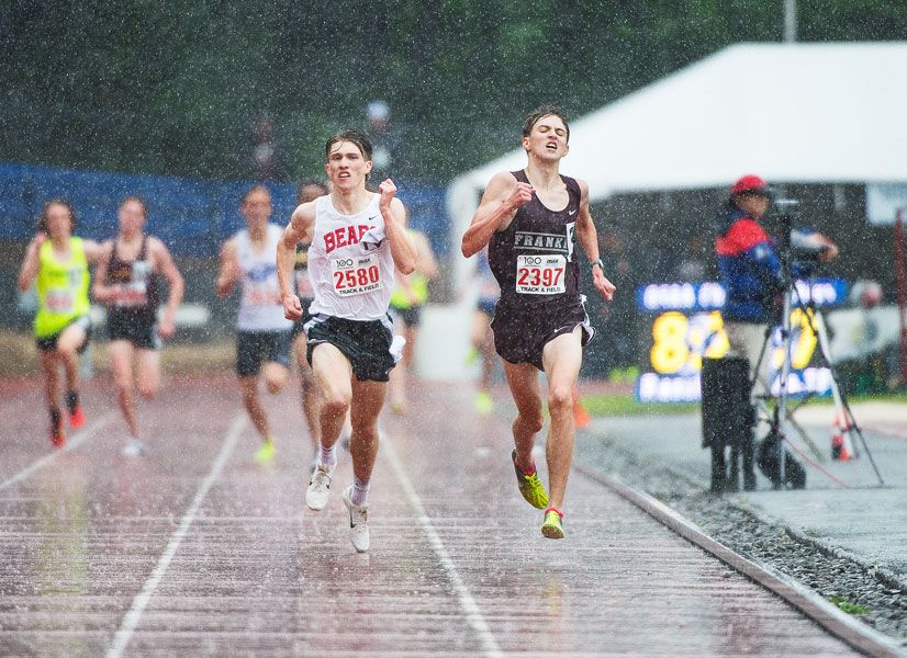 Marcus Larson/News-Register##
McMinnville s Zane Fodge sprints toward the finish line of the Class 6A OSAA Track and Field Championships.