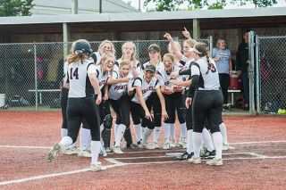 Rusty Rae/News-Register##
Dayton Pirates celebrate Anna Mullins’ (14) home-run during Friday’s quarterfinal game against Yamhill-Carlton. Rusty Rae/News-Register##
Dayton Pirates celebrate Anna Mullins’ (14) home-run during Friday’s quarterfinal game against Yamhill-Carlton.