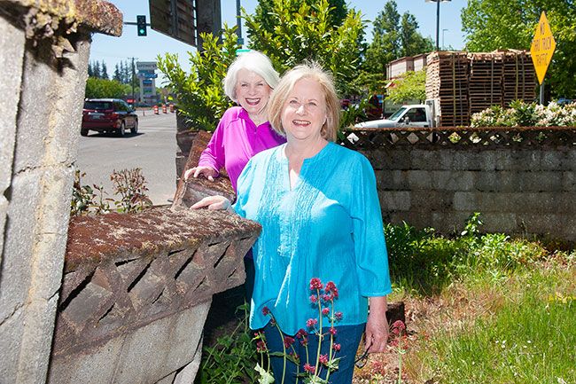 Rusty Rae/News-Register ## Joan Buccino, right, and her neighbor, Jan Stoven, are leading the effort to repair and save the Malone Cemetery, a tiny plot that dates from the mid-19th century. The family cemetery is located at 99W and Grandhaven Street, next to the Wilco Farm Store.