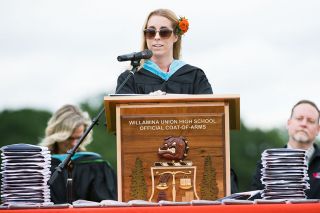 Marcus Larson/News-Register##
Commencement speaker Amy Korst addresses the crowd at Willamina s graduation Saturday afternoon. The English teacher wished students well in their future experiences.