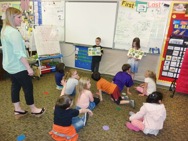Starla Pointer / News-Register##
Newby kindergartners compare frogs and toads. Frogs are smaller and live around water, while toads have bumpy skin and prefer dry places, they told their teacher, Megan Cunningham. Both eat bugs, they said.