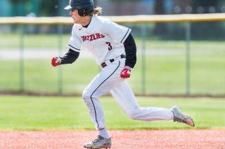 Rusty Rae/News-Register file photo##
McMinnville centerfielder Colton Smith races toward second base during the Grizzlies’ second round matchup against Beaverton. Smith was recently named second team, all-state for his efforts in his senior season. Rusty Rae/News-Register file photo##
McMinnville centerfielder Colton Smith races toward second base during the Grizzlies’ second round matchup against Beaverton. Smith was recently named second team, all-state for his efforts in his senior season.
