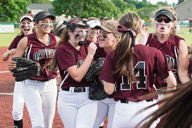 Marcus Larson/News-Register##The Dayton softball team celebrates its 1-0 victory against Pleasant Hill in the OSAA Class 3A softball state semifinals Tuesday evening at Jim Connelly Field.