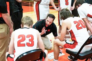 Marcus Larson/News-Register##
During a late timeout, McMinnville head coach Willie Graham goes over the game plan with his team. Marcus Larson/News-Register##
During a late timeout, McMinnville head coach Willie Graham goes over the game plan with his team.