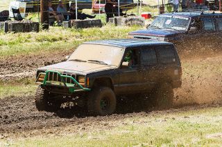 Marcus Larson/News-Register##
Kathy Cawley pulls ahead, despite her muddy window, in her heat of the five cylinder engine class during the Willamina Mud Drags on Saturday. Marcus Larson/News-Register##
Kathy Cawley pulls ahead, despite her muddy window, in her heat of the five cylinder engine class during the Willamina Mud Drags on Saturday.