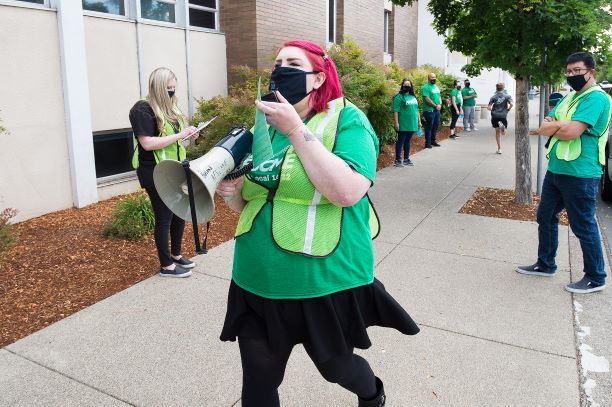 Paige Barton, a council representative for Oregon AFSCME, rallied with employees at the courthouse on Thursday. Marcus Larson/News-Register