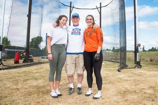 Rusty Rae/News-Register##
Amity’s track and field program showed off its brand new hammer ring during Saturday’s throws meet. The project was spearheaded by head coach Randy Hayes (center). At Saturday’s event, alumni and Division I throwers Amy Kraemer (left) and Lindsay McShane (right) threw the inaugural attempts at the facility. Rusty Rae/News-Register##
Amity’s track and field program showed off its brand new hammer ring during Saturday’s throws meet. The project was spearheaded by head coach Randy Hayes (center). At Saturday’s event, alumni and Division I throwers Amy Kraemer (left) and Lindsay McShane (right) threw the inaugural attempts at the facility.