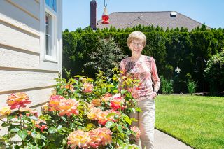 Rusty Rae/News-Register ## Elsie Williams enjoys the flowers and foliage surrounding the home where she’s lived since January 1993. Her abundant perennials, annuals, succulents, trees and bushes led to her receiving Yard of the Month honors in June from the McMinnville Garden Club.