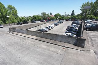 Rockne Roll/News-Register##McMinnville’s parking garage was constructed in 1980 using funds that would have gone toward constructing
a bridge over the Willamette to I-5, connecting Yamhill County with the freeway. That projected bridge never materialized after costs ballooned.