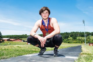 Marcus Larson/News-Register##
Willamina track and field star David Hensley, pictured at the Bulldogs’ long jump pit, earned two state titles in his senior season. Hensley, seen with his earbuds in, was known for listening to music prior to his jumps. The habit helped him focus for the upcoming attempt. Marcus Larson/News-Register##
Willamina track and field star David Hensley, pictured at the Bulldogs’ long jump pit, earned two state titles in his senior season. Hensley, seen with his earbuds in, was known for listening to music prior to his jumps. The habit helped him focus for the upcoming attempt.