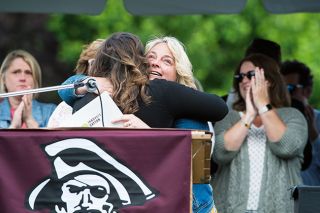 Marcus Larson/News-Register##
Dayton High School Principal Jami Fluke receives a hug from Sherri
Sinicki before giving her speech to the graduating class of 2019.
Sinicki introduced the principal, who is leaving to take another job, in
glowing terms.