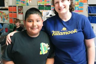 Submitted photo##
Columbus School third-grader Javi Becerra poses with Amber Nyssen of the Tillamook ice cream company. She responded to Javi s letter by providing an ice cream party for the hardworking students.