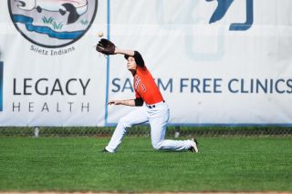 Marcus Larson/News-Register file photo##
Yamhill-Carlton center fielder Mikel Rivas makes an incredible catch during the Tigers’ tournament game against Scio March 29. Rivas was recently named a second-team all-league outfielder in the PacWest Conference. Marcus Larson/News-Register file photo##
Yamhill-Carlton center fielder Mikel Rivas makes an incredible catch during the Tigers’ tournament game against Scio March 29. Rivas was recently named a second-team all-league outfielder in the PacWest Conference.