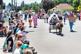 News-Register file photo##Participants walk and ride in the first Hometown Days parade. News-Register file photo##Participants walk and ride in the first Hometown Days parade.