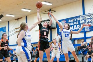 Marcus Larson/News-Register##
Yamhill-Carlton’s Kendall Stephens tries for a putback after grabbing an offensive rebound against Amity. Marcus Larson/News-Register##
Yamhill-Carlton’s Kendall Stephens tries for a putback after grabbing an offensive rebound against Amity.