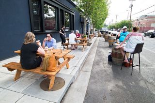 Marcus Larson/News-Register##Diners enjoy an outdoors experience at Red Hills Kitchen in McMinnville.