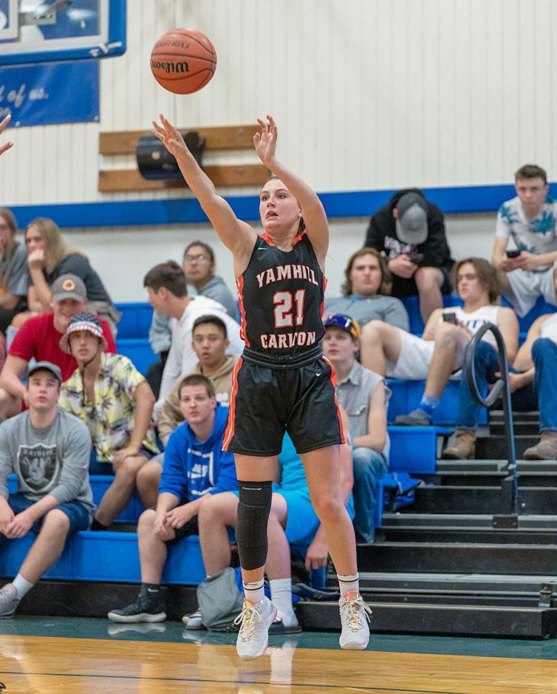 Olivia Southard fires a three-pointer against Amity during the condensed girls basketball season in May 2021.
