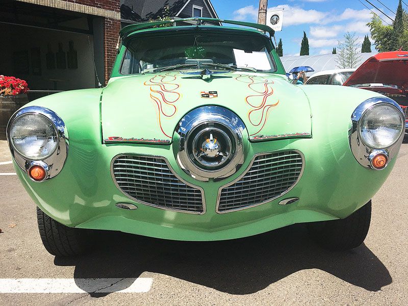 Submitted photo##
Jonathan Cox s 1951 Studebaker, dubbed the  Studepickle  for its
distinctive green color, draws onlookers at the Carlton Fun Days car show.