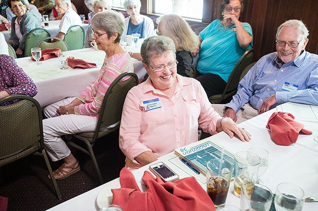 Marcus Larson/News-Register##
Yvonne (Lofton) Hedgecock laughs with the rest of her class after giving a short speech at the Mac High 60th class reunion. She recalled dipping ice cream after school at Trills, now called Alf s.