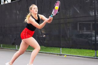 Marcus Larson/News-Register file photo##
McMinnville senior Lucy
Angevine returns a shot during
a tennis match against Glencoe
during the 2022 spring season.
Angevine was a three-sport
standout for the Grizzlies the
past four years, but lost multiple
opportunities during the pandemic.