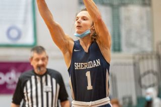 Marcus Larson/News-Register file photo##
Sheridan senior Gavin Anderson pushes a three-pointer during the team’s January contest against Salem Academy.