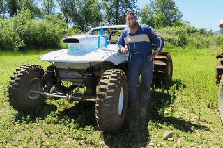 Photo courtesy Sherry Dawkins##
Jeremy Schutte of Lafayette poses with his victorious 1980 modified Toyota pick-up, which
won the Willamina Mud Drags’ Open Class race on Saturday.