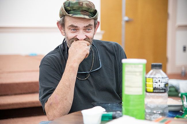 Rusty Rae/News-Register##Robert, who did not provide his last name, found respite from 109-degree temperatures at the cooling shelter at First Baptist Church. He was homeless and living at a campsite near the Yamhill River