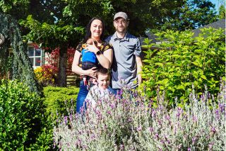 Rusty Rae/News-Register##
Michael and Tiffany Philips enjoy their yard at 1322 Blaine St., McMinnville, with their sons, baby Alexander and 4-year-old Harrison.