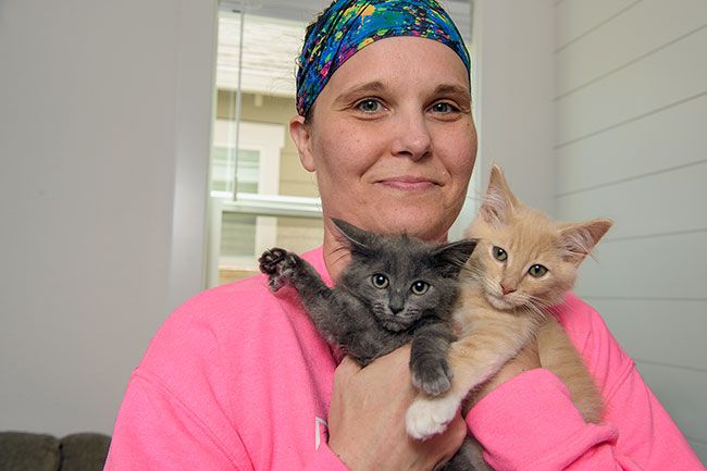 Rusty Rae/News-Register
Amber Blankenship holds Pepper and Curry, two of four kittens she named for spices. they are among more than 100 she has cared for since becoming a volunteer with Homeward Bound Pets.