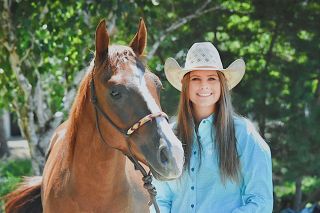 Photo courtesy Olivia Davison##
Yamhill-Carlton rodeo star Olivia Davison poses with her horse, Lil’ Rey, earlier in the season. Davison and Lil’ Rey recently qualified for Nationals in the sport of cutting, which involves
separating cows from the herd. The two will compete with Team Oregon July 18-24 in Lincoln, Nebraska. Photo courtesy Olivia Davison##
Yamhill-Carlton rodeo star Olivia Davison poses with her horse, Lil’ Rey, earlier in the season. Davison and Lil’ Rey recently qualified for Nationals in the sport of cutting, which involves
separating cows from the herd. The two will compete with Team Oregon July 18-24 in Lincoln, Nebraska.