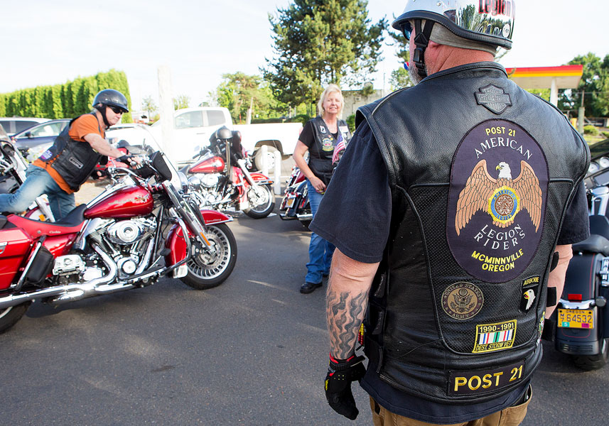 Rockne Roll/News-Register##Jerry Perry, right, and other American Legion Riders prepare for a group ride to Dayton at American Legion Post 21 in McMinnville. They went to support Rider Jim Connolly, who was playing with Second Winds in the Dayton park.