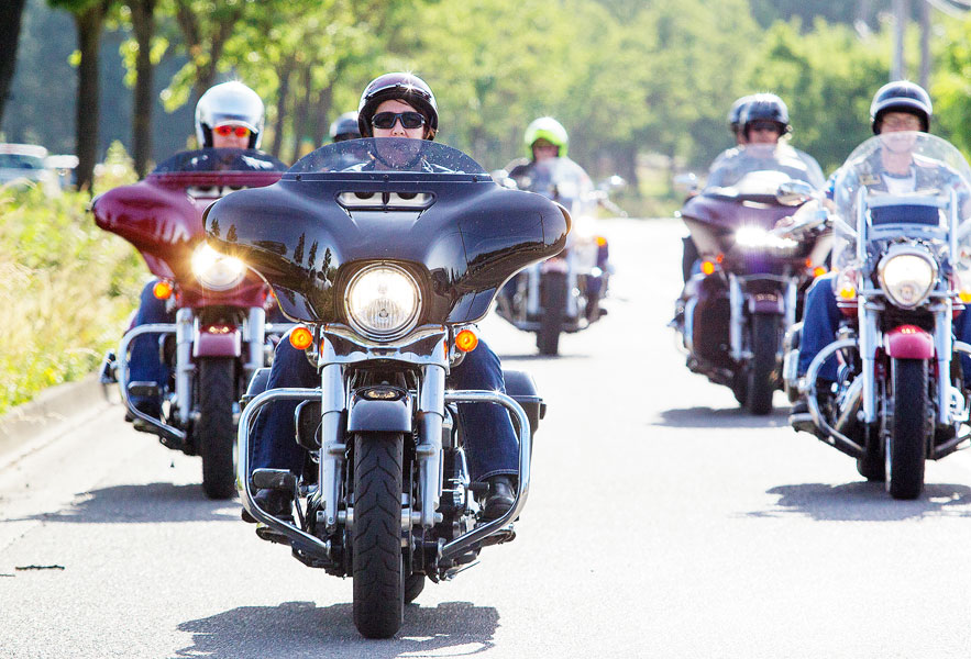 Rockne Roll/News-Register##Members cruise along Northeast Cumulus Avenue in McMinnville. Riding together builds camaraderie.