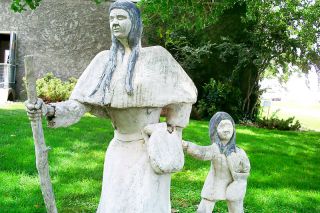 Image: Rebecca Maxwell/Historic Marker Database, HMdb.org##A statue of Marie Dorion with one of her children, erected by the Idaho State Historical Society near Fort Boise, where she survived a winter alone in the wilderness with her two boys.