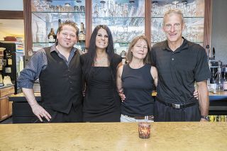Tina’s new owners, (from left) Michael and Dawn Stiller, and Karen and Dwight McFaddin, stand in the bar of their newly acquired restaurant.