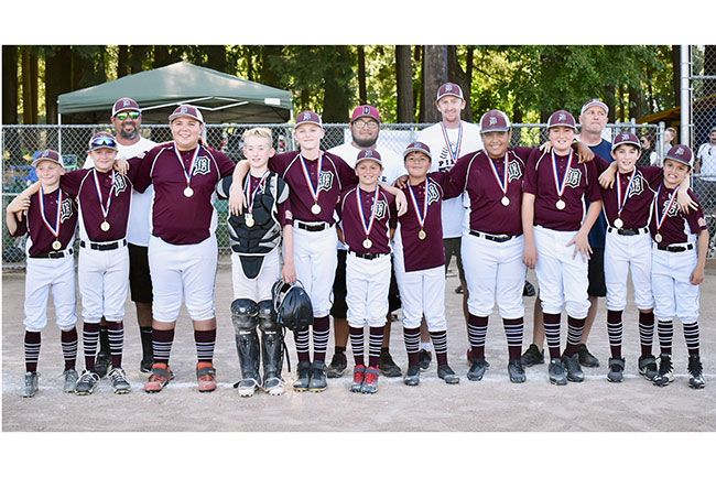 Photo courtesy Lauri Douthit##
Dayton’s Team Wegner poses with their Minor National District Championship medals after their performance in the JBO tournament last weekend.
