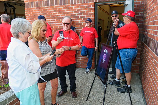 Rusty Rae/News-Register##
George Dunkel, who was a student firefighter under Chief Jerry Smith, his wife Vickie Dunkel and friend Billie Wallace recall the old days while gathered at the McMinnville fire hall for dedication of a plaque and a scholarship in honor of Smith. He was fire chief from the 1960s into the ‘90s.