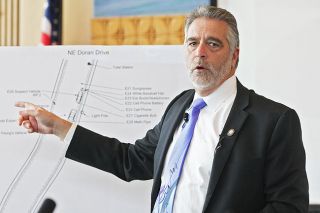 Rockne Roll/News-Register##District Attorney Brad Berry describes a diagram of the July 1 officer-involved shooting during a press conference Thursday afternoon at the McMinnville Civic Center.