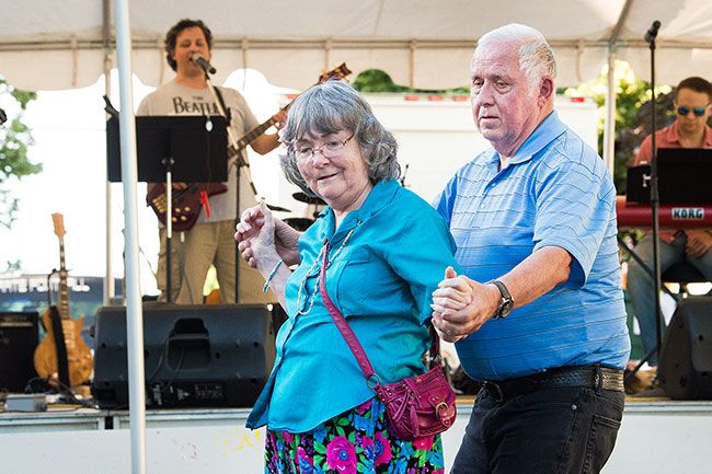 Marcus Larson/News-Register##
Friends Jackie Dornon and Ralph Dowdle enjoys a dance to the music of the band Layman s Terms at Turkey Rama.