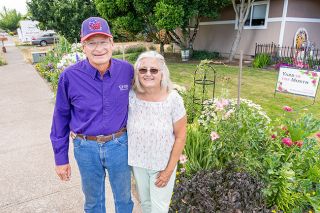 Marcus Larson/News-Register ## John and Beccie Holland enjoy growing flowers and vegetables in their Cypress Street yard.