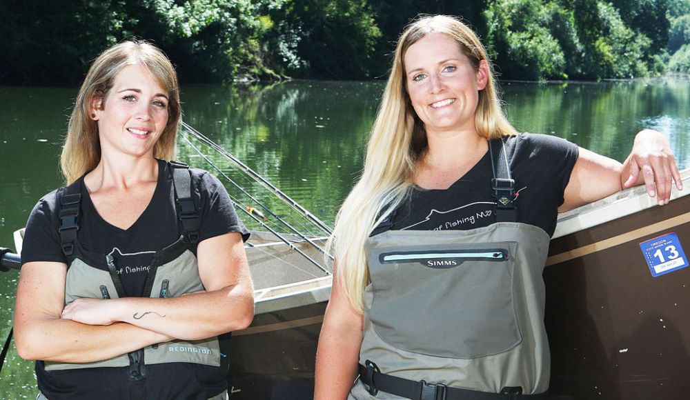 News-Register file photo##
McMinnville residents Sara Dodd (left) and Kristin Bishop, the Reel Women of Fishing, pose for a photo along the Yamhill River in Dayton.
