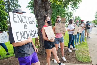 Rusty Rae/News-Register##Protesters seek the removal of Linfield University Board of Trustees Chair David Baca at at July 16 rally.