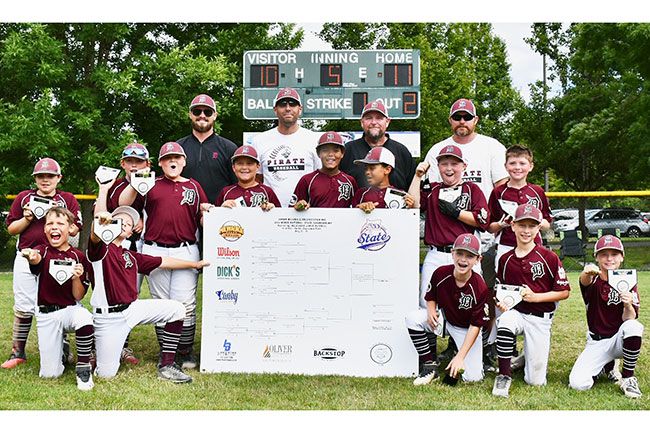 Photo courtesy Lauri Douthit##
Dayton’s Minor National JBO team poses with their state championship bracket after defeating McMinnville 11-10 Sunday at North Clackamas Park.